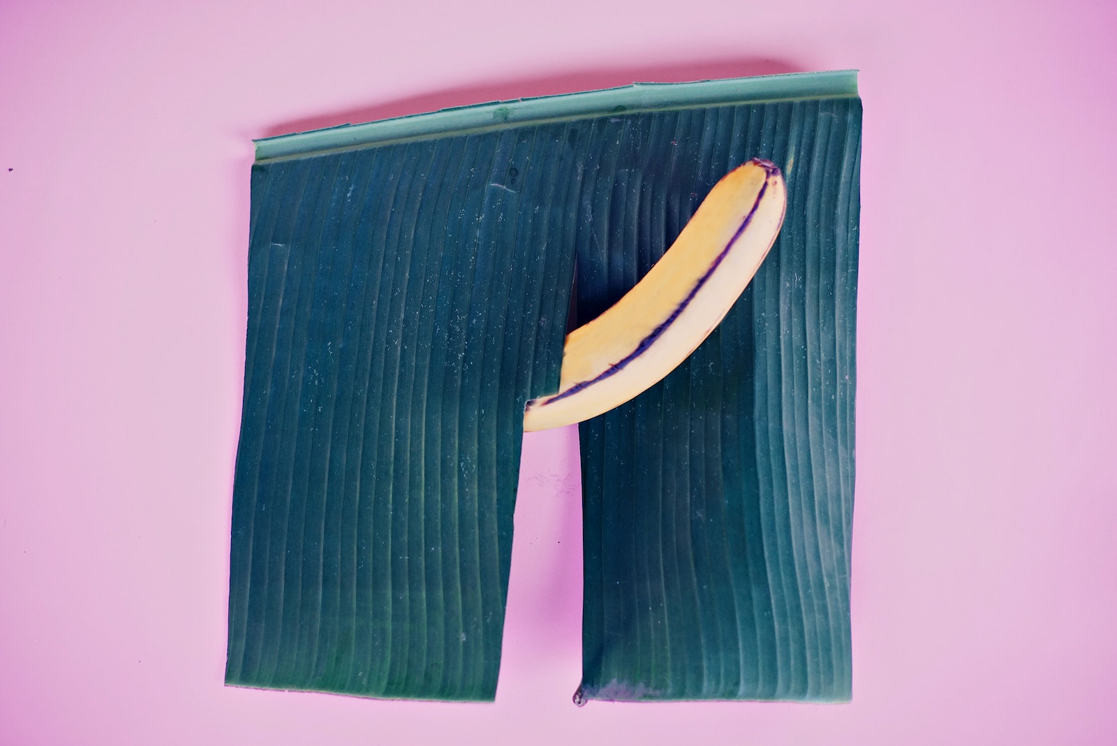 Yellow Banana on Purple Background