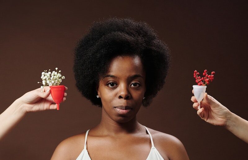 A Woman with Afro Hair Wearing Bra